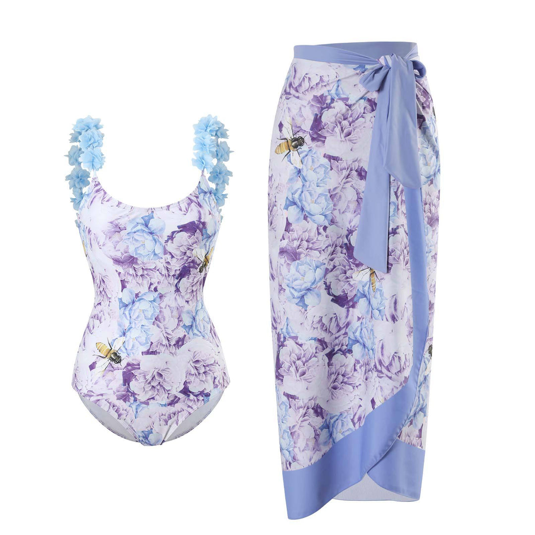 Dame Højskåret Én-delt Badedragt med blomstermotiver og matchende Wrap Skirt Stilla