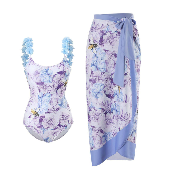 Dame Højskåret Én-delt Badedragt med blomstermotiver og matchende Wrap Skirt Stilla