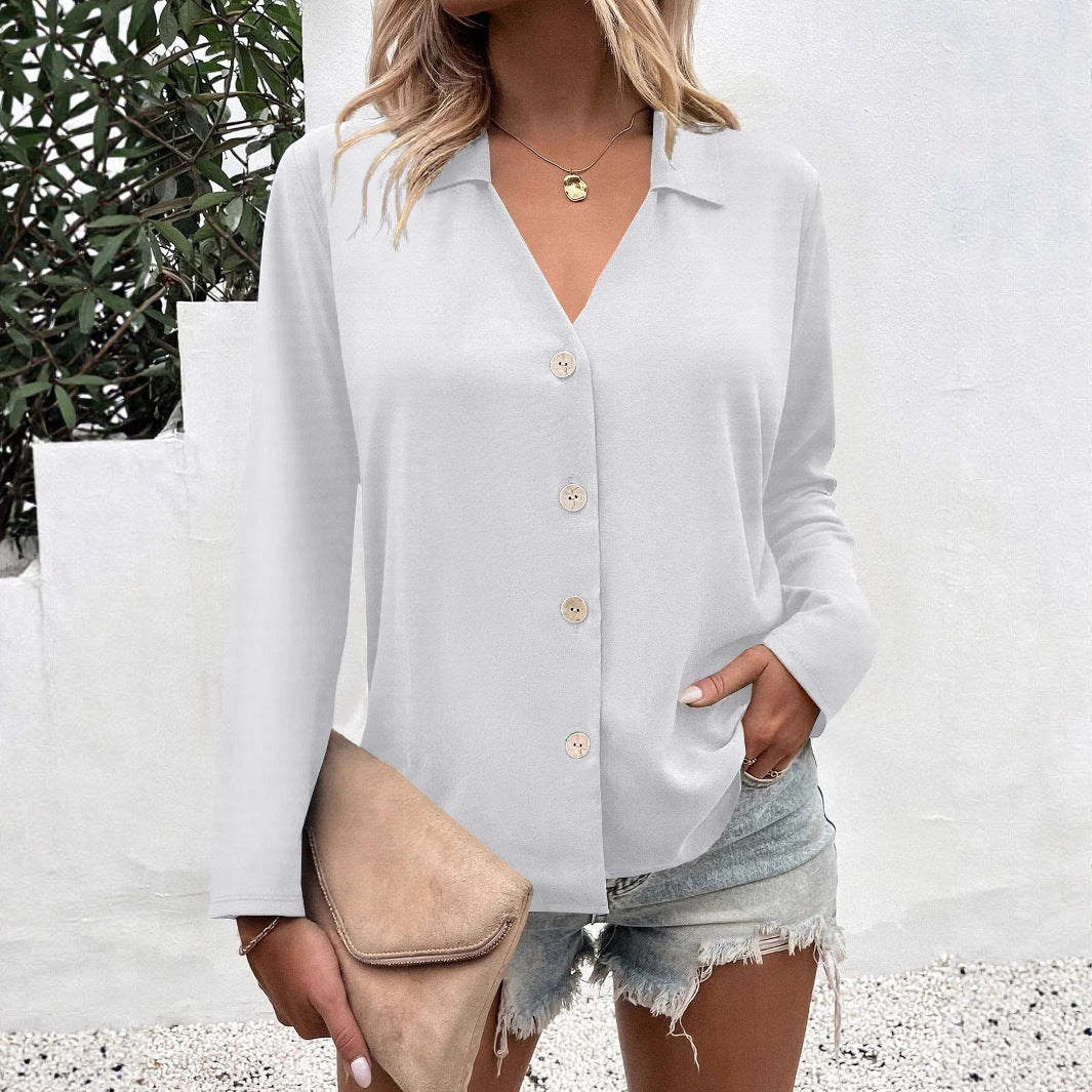 Dame elegant bluse med V-hals og knapdetaljer Stilla