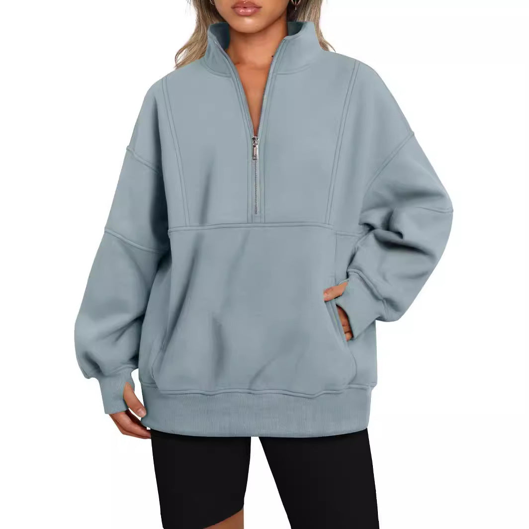 Dame Sporty Hoodie med halvdelen lynlås og voluminøse ærmer Stilla