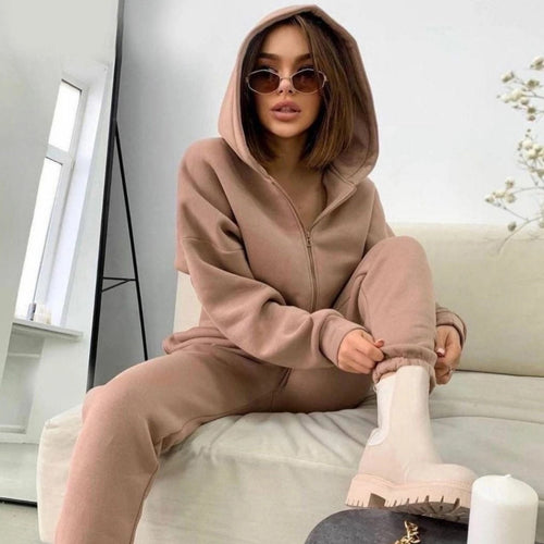 Kvinders hætte jumpsuit lavet af fleece af høj kvalitet med praktisk lynlås og elastisk talje Skovae