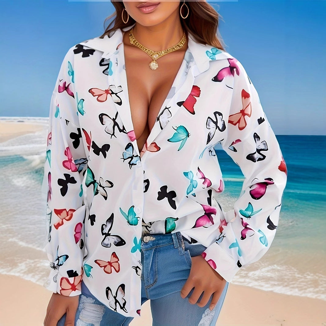 Damebluse med farverigt sommerfugledesign og afslappet snit Stilla