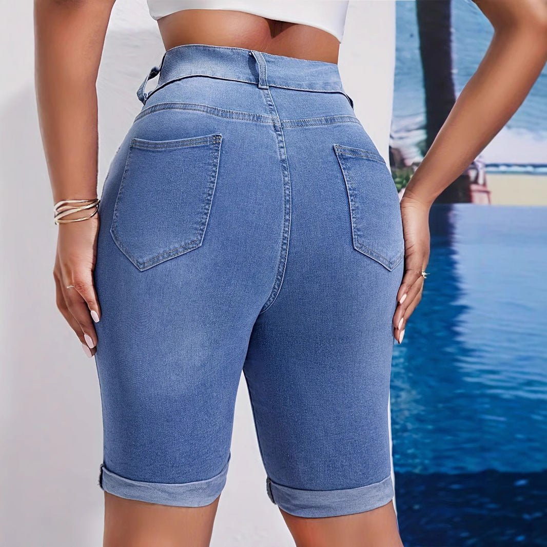Dame High-Waist Denim-Shorts med vintage-effekter og knaplukning Stilla