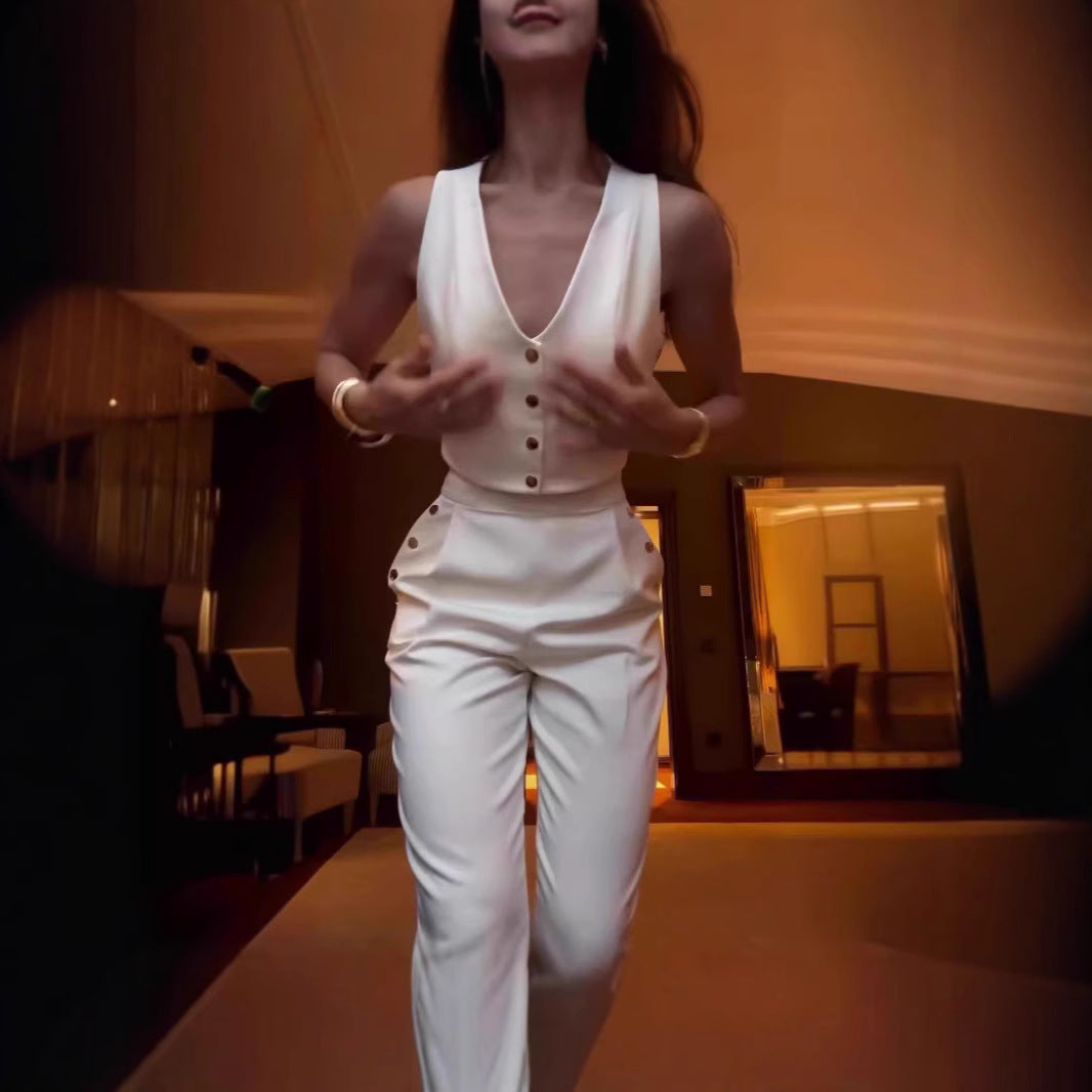 Dame crop-top med elegante knapper og højtaljede bukser Stilla