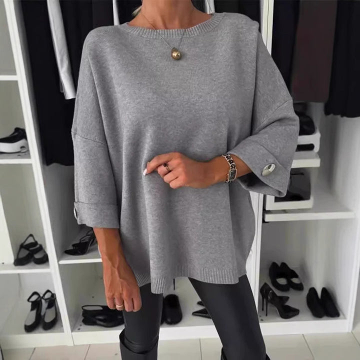 Damer mode oversized sweater med elegante knapdetaljer Stilla