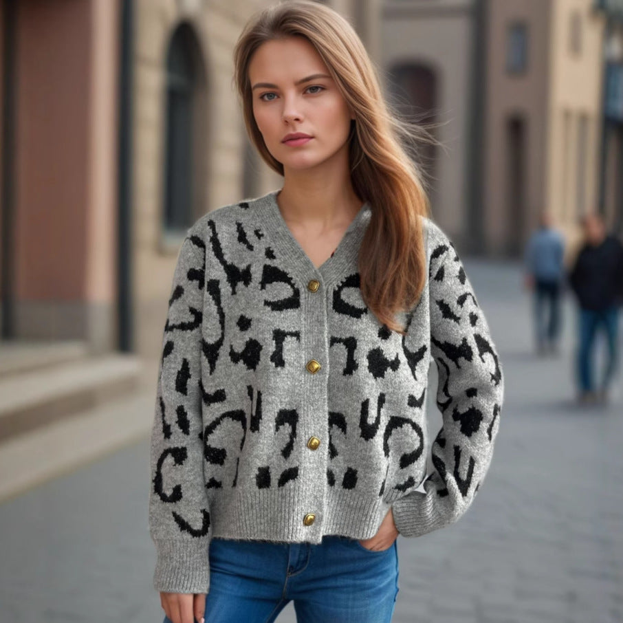 Kvinders fashionable cardigan med dyreprint og guldknapper Stilla