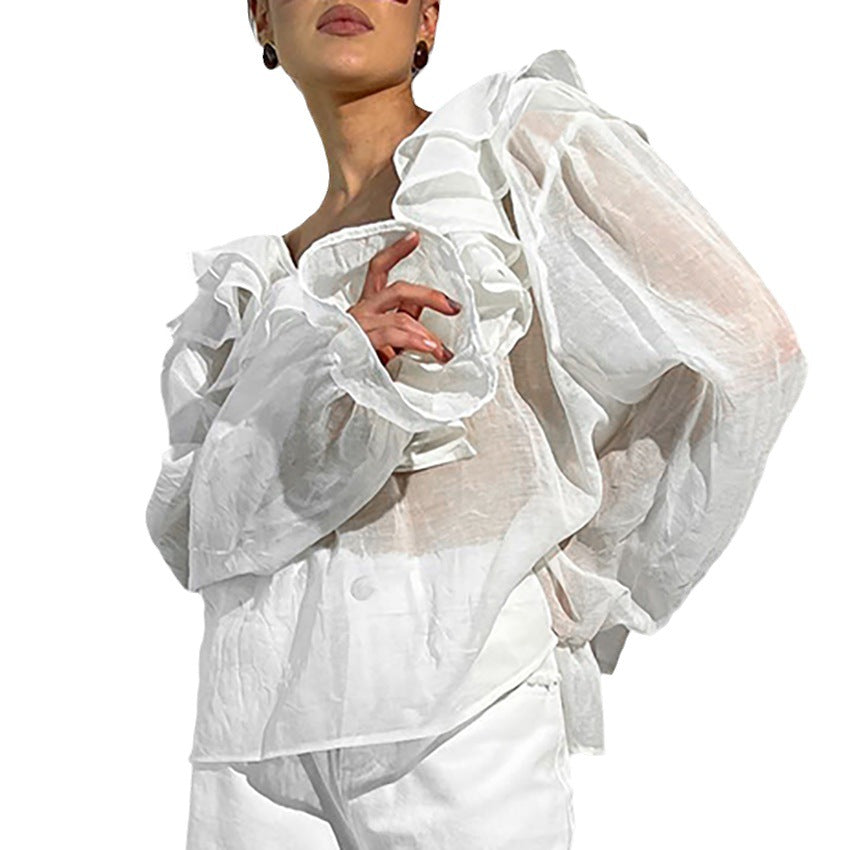 Damebluse med elegante flæser og afslappet snit Stilla