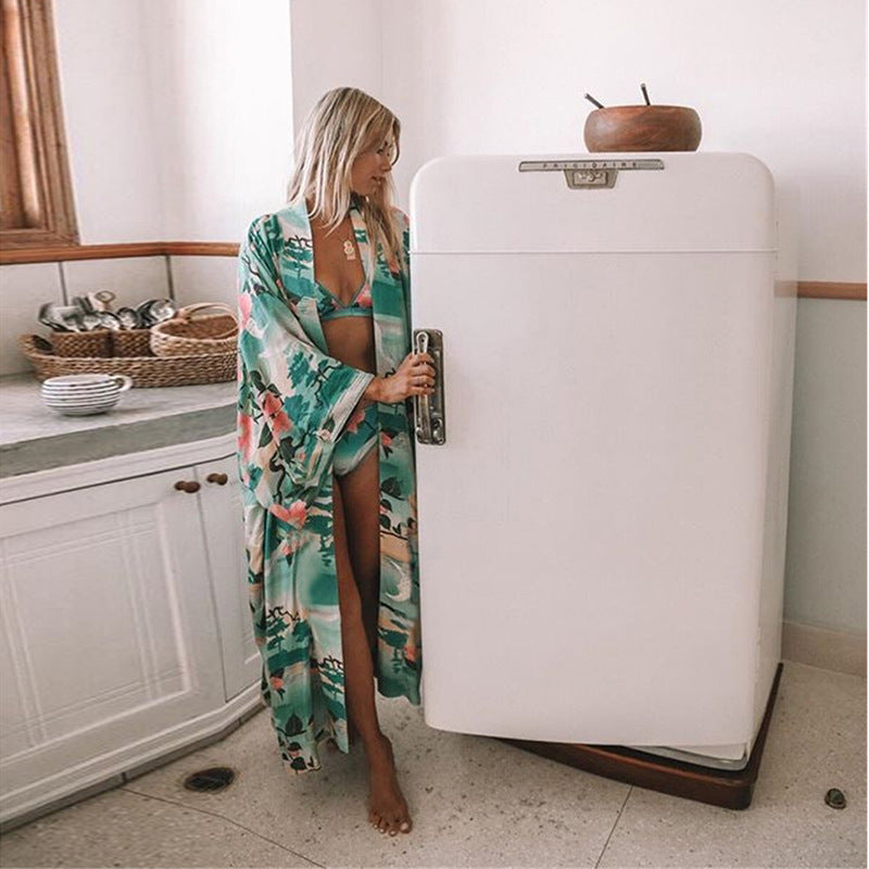 Dame Maxi-strandkjole med elegante sidespalter og blomsterdesign Stilla