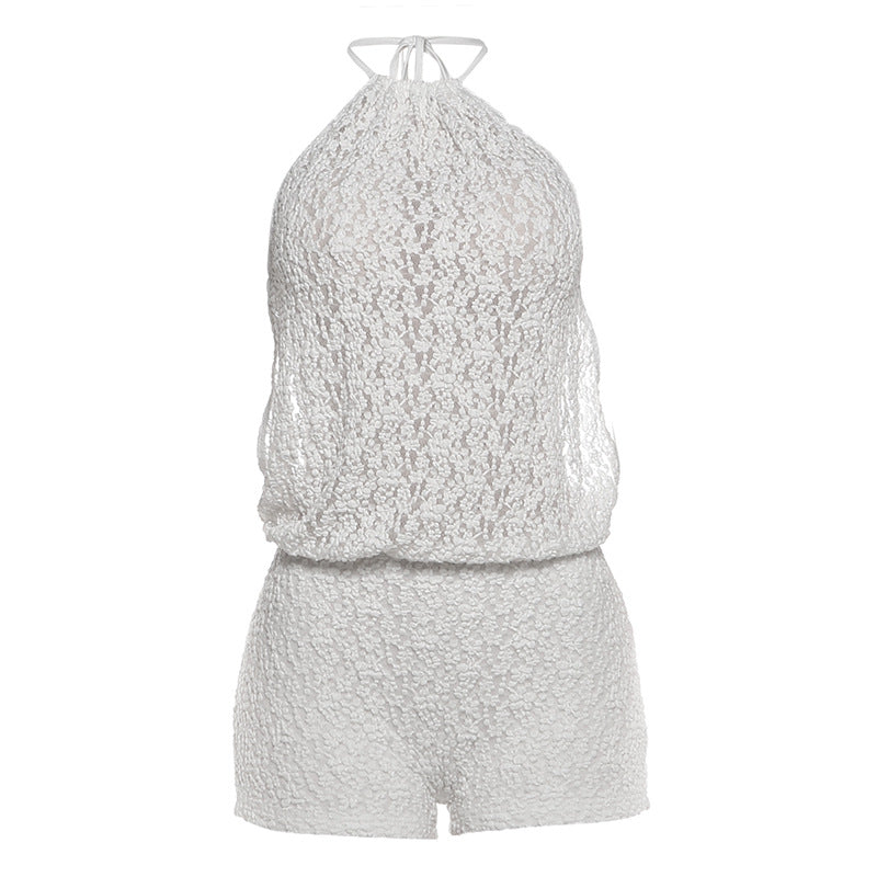Dame afslappet jumpsuit i gennemsigtigt stof med blomstermotiv Skovae