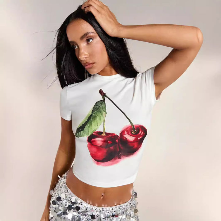 Dame crop top med blomstret grafisk print og tætsiddende pasform Skovae
