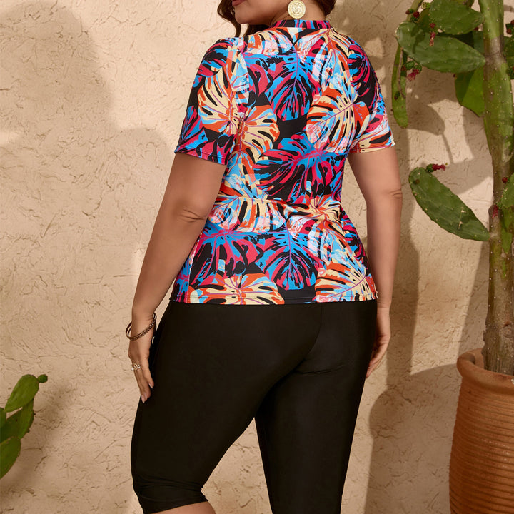 Dame sportlig bluse med floral design og casual leggings Skovae