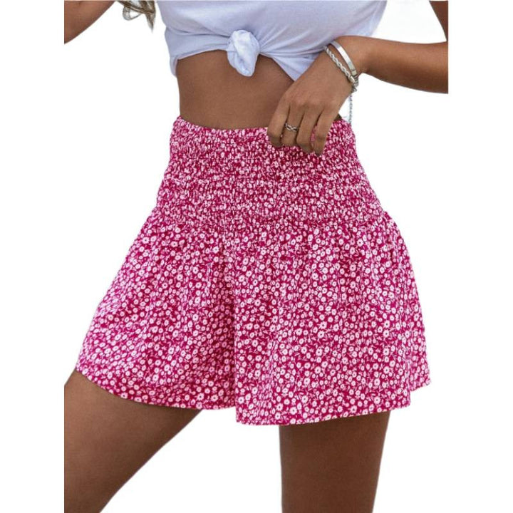 Dame shorts med elastisk taljebånd og blomsterdesign Skovae