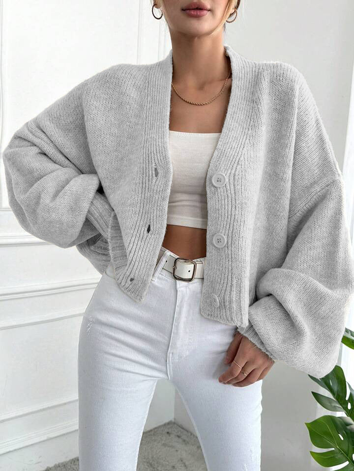 Women’s casual chunky knit cardigan with button-up design and voluminous sleeves Stilla