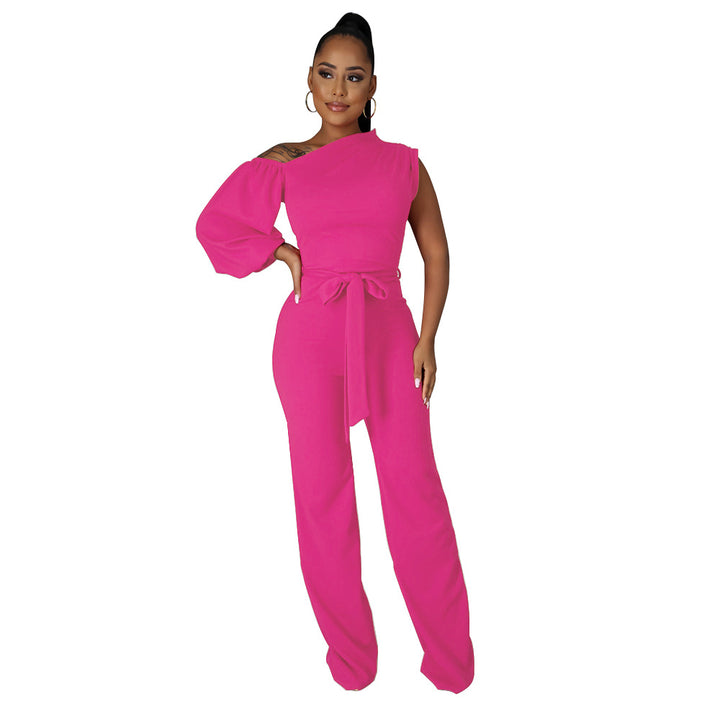 Dame jumpsuit med asymmetrisk snit og voluminøse ærmer Stilla