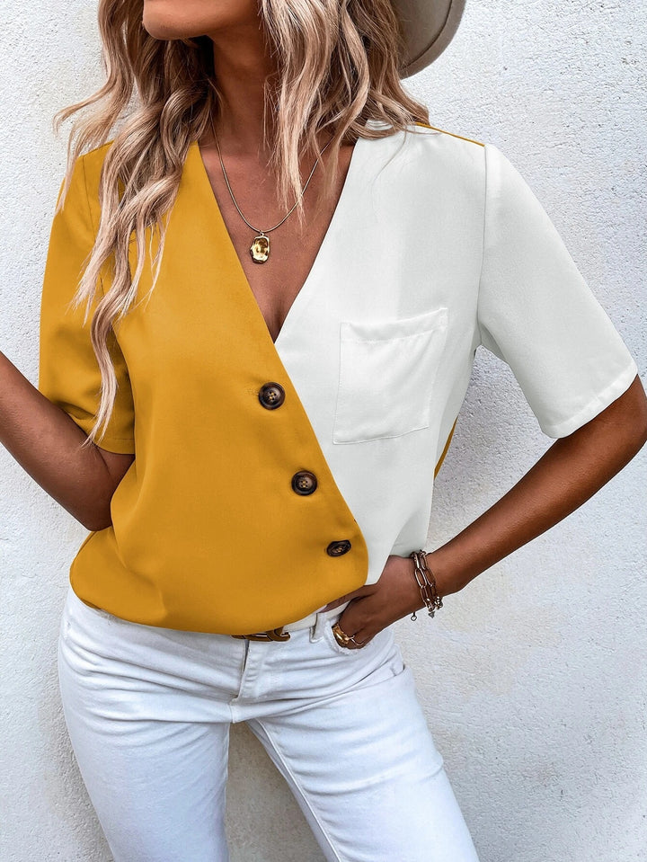 Damebluse med moderne pasform og kontrasterende farver Stilla