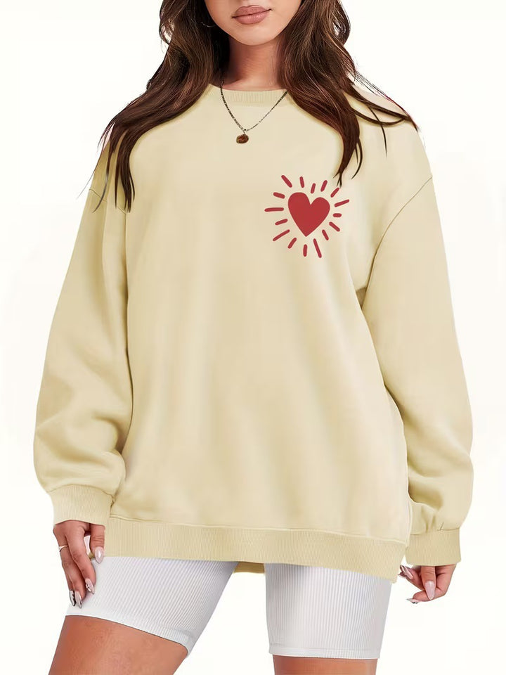 Kvinders sweatshirt med afslappet hjertemotiv og oversized pasform Skovae