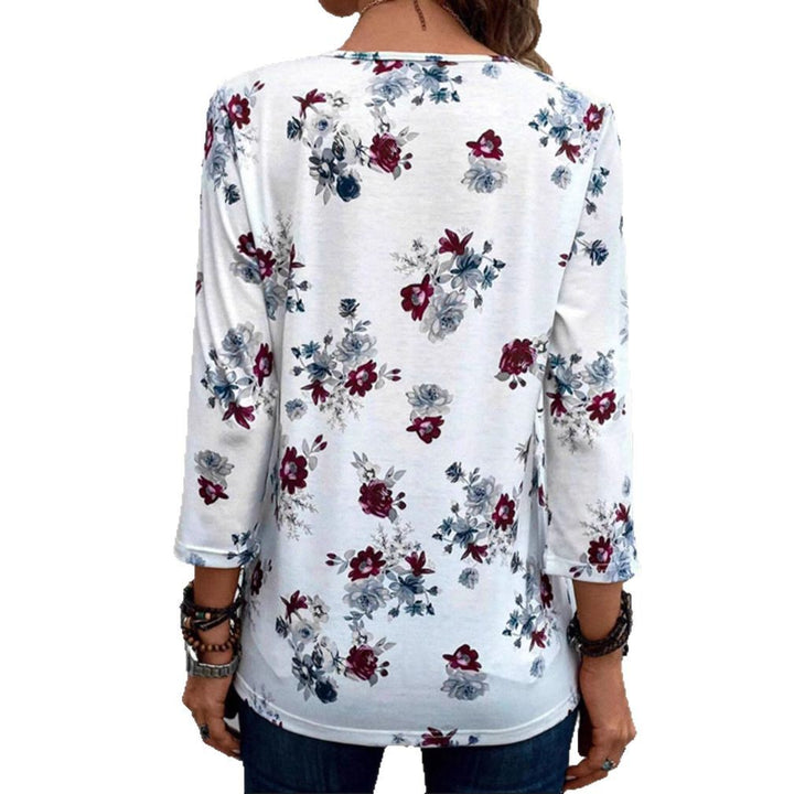 Kvinders bluse med blomsterprint og knapdetaljer Stilla