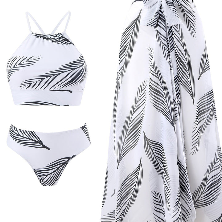 Dame bikini-sæt med stilfuld indpakningsnederdel og trendy bladdesign Stilla