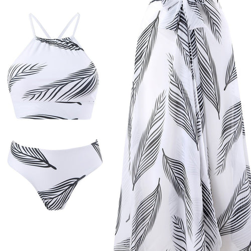 Dame bikini-sæt med stilfuld indpakningsnederdel og trendy bladdesign Stilla