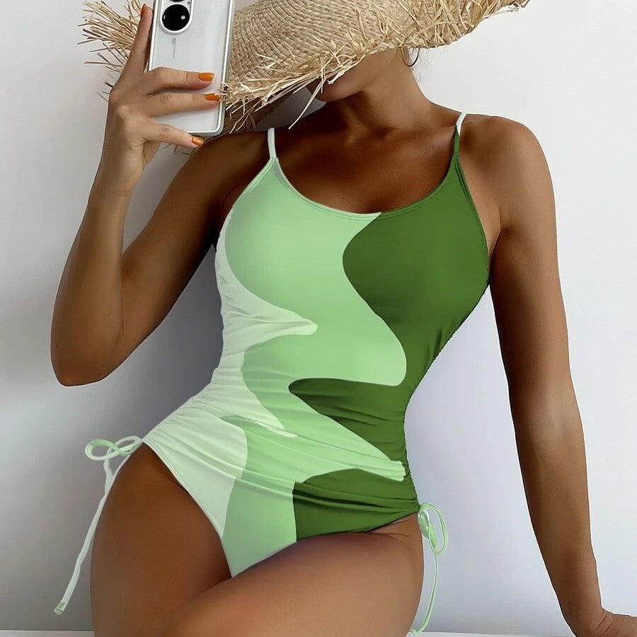Dame heldragt badebadedragt med legende cut-outs og blomstret design Skovae
