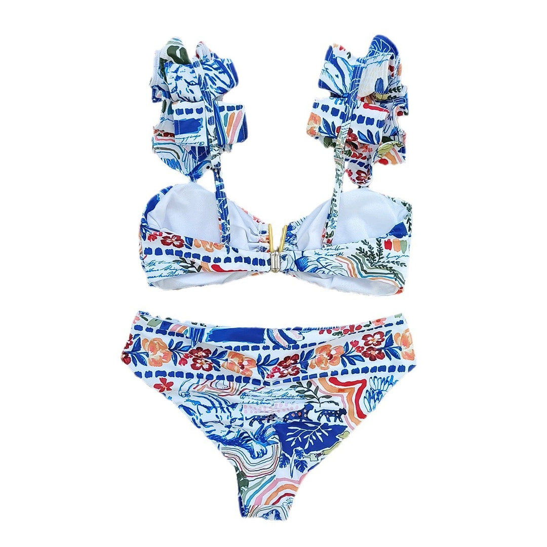 Dame bikini-sæt med voluminøse flæsedetaljer og elegant blomster-design Stilla