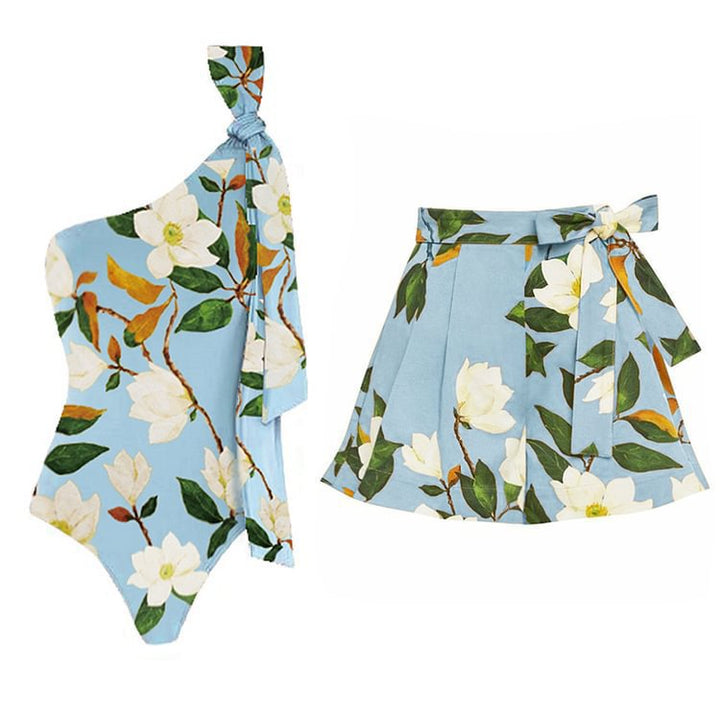 Dame heldragt badedragt med blomsteret indpakningsnederdel og moderne one-shoulder-design Stilla