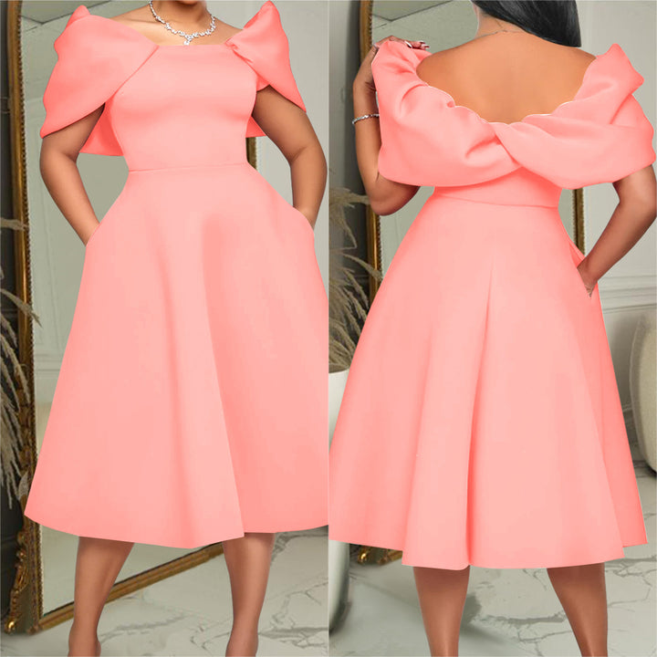 Damer glamourøst midikjole med off-shoulder design og voluminøse puffærmer Stilla