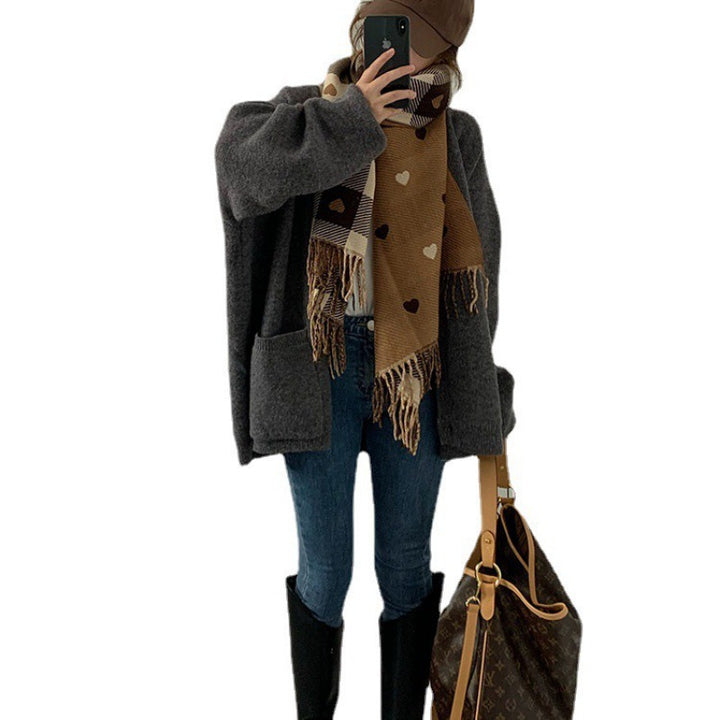 Kvindernes oversized cardigan med praktiske lommer og V-hals Stilla