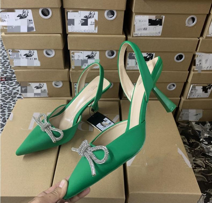 Dame nan elegante Slingback-Pumps med spids tåhætte og funkende strassløkke Skovae