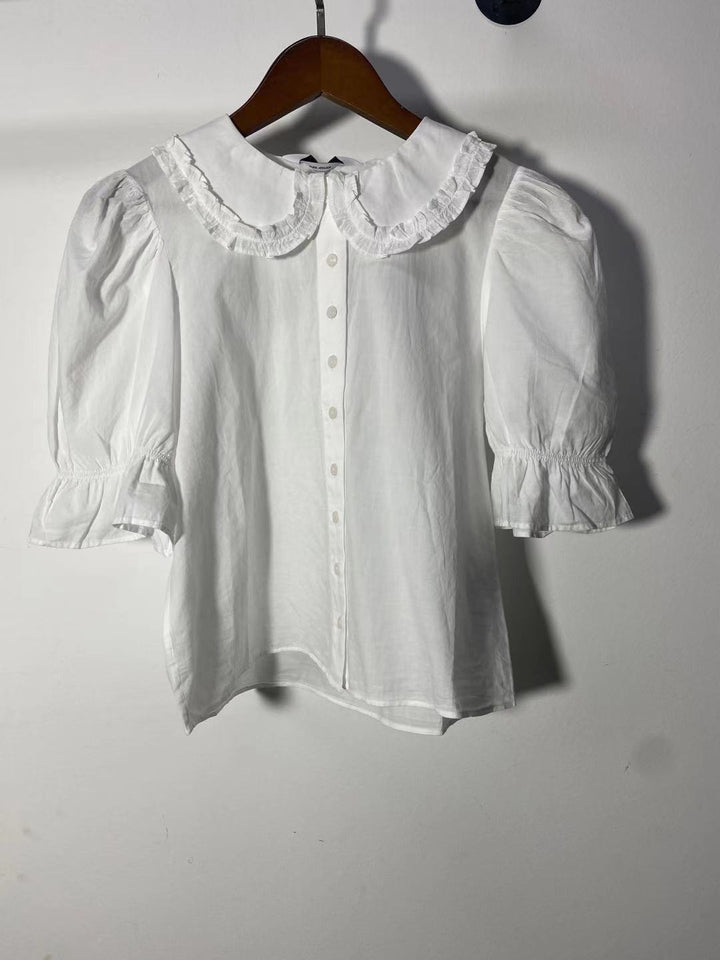 Damebluse med voluminøse puffærmer og dekorativ spidskrave Stilla