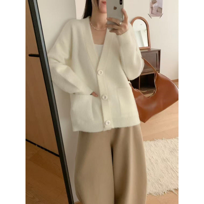 Kvinders fluffy knap cardigan med elegante lommer Stilla