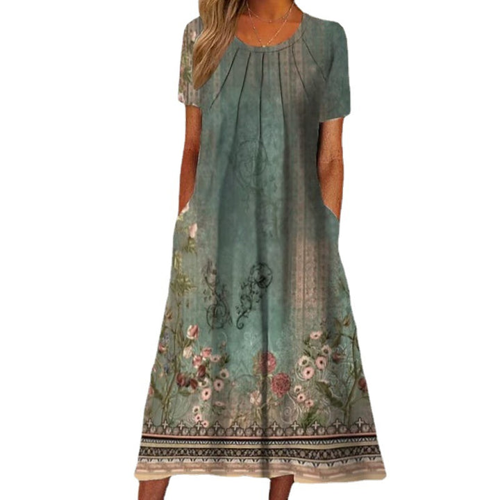 Dame sommerligt maxikjole med blomstret design og praktiske lommer Stilla