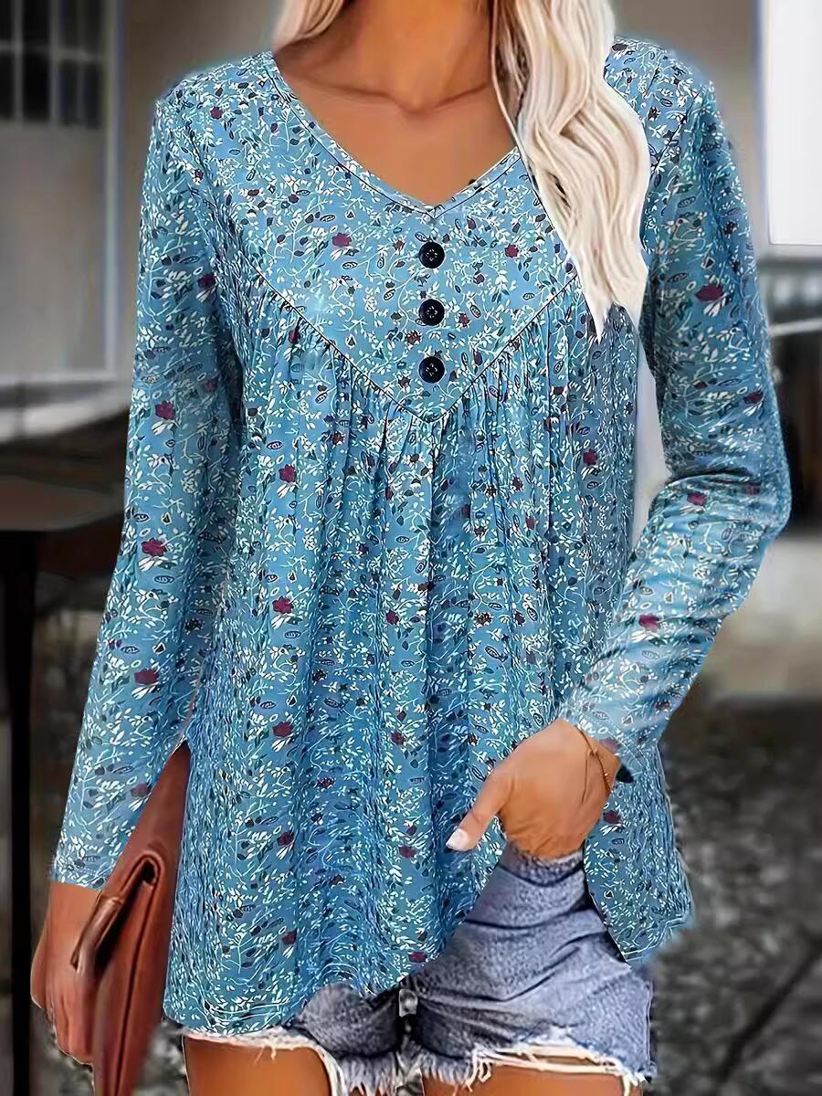 Damebluse med blomsterdesign og knapdetaljer Stilla