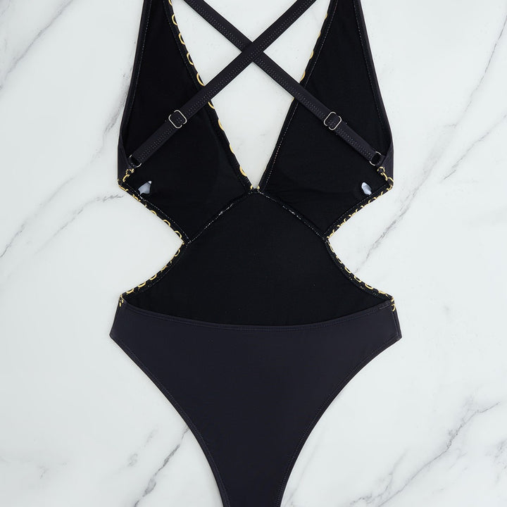 Dame én-delt badesuit med elegant mønster og skimrende detaljer Skovae
