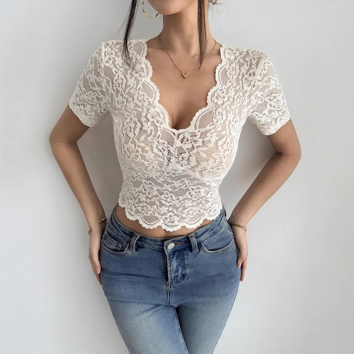 Dame nan kort tætsiddende spids crop top med V-udskæring, bølget kant og elastisk blomster-mønstrede spids Skovae