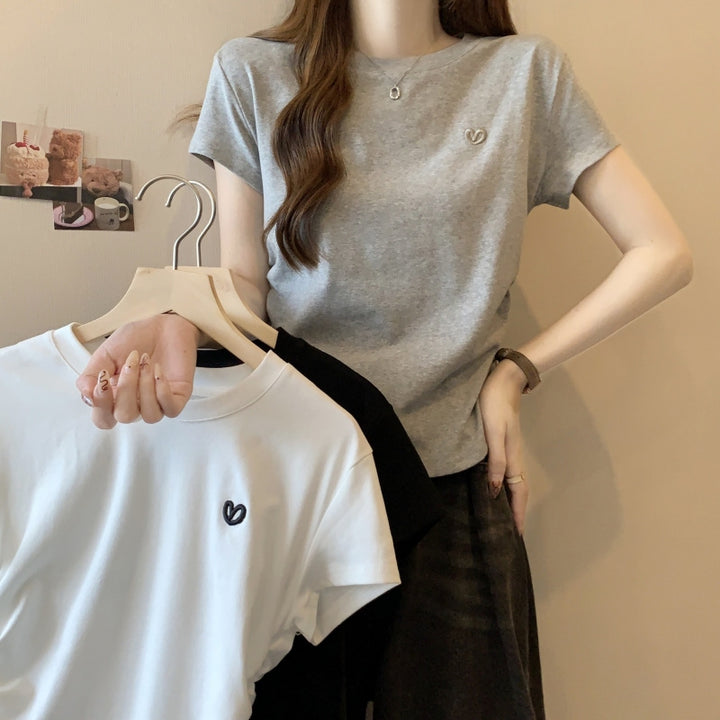 Femme Klassisk Kortærmet Bomulds T-shirt med Minimalistisk Logo Stilla