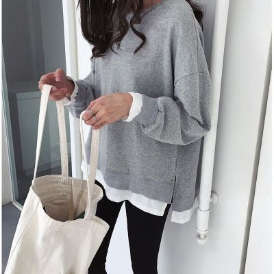 Kvinders afslappede sweatshirt med løs pasform og moderne detaljer