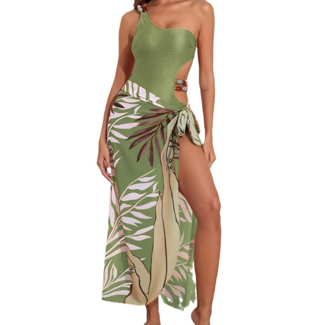 Dame badedragt sæt med asymmetrisk top og elegant sarong Skovae