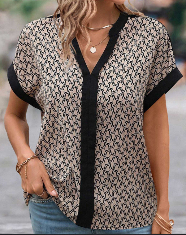 Dame nan let boxy bluse i crepe-look med V-udskæring og kontrastpaspel Skovae