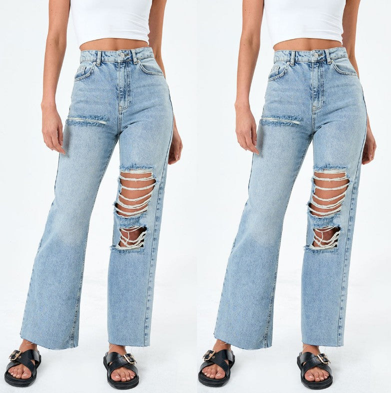 Dame High-Waist Jeans med fashionabelt Destroyed-elementer Stilla