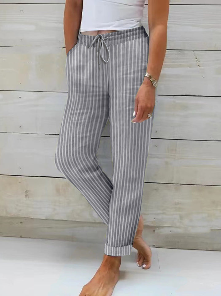 Dame fritidshose med trendy stribet mønster og elastisk talje Stilla