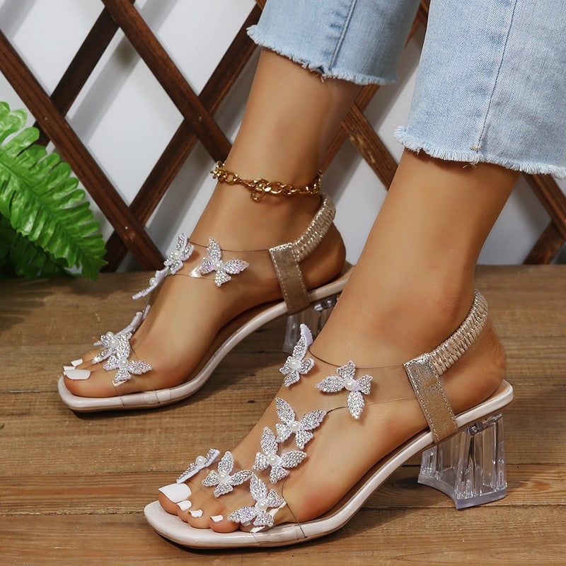 Dame glamourøse sandaler med funklende sommerfugledetaljer og transparent blokhæl Stilla