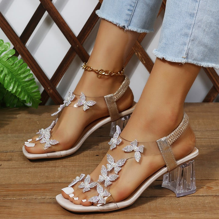 Dame glamourøse sandaler med funklende sommerfugledetaljer og transparent blokhæl Stilla