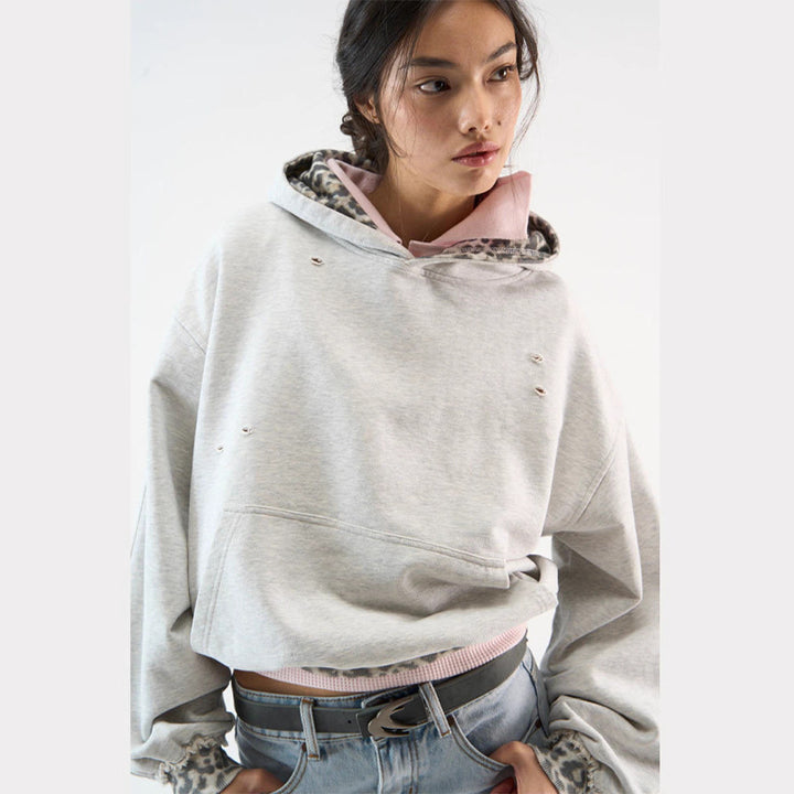 Kvinders hættetrøje med fashionable dyreprint og drømmende snit Stilla