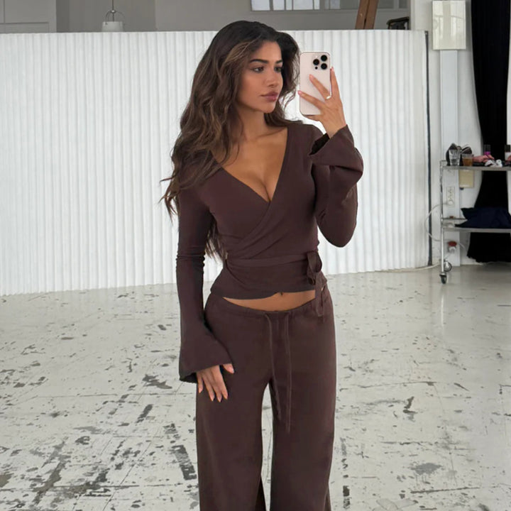 Damer løs jumpsuit med omslag design og lange ærmer Skovae
