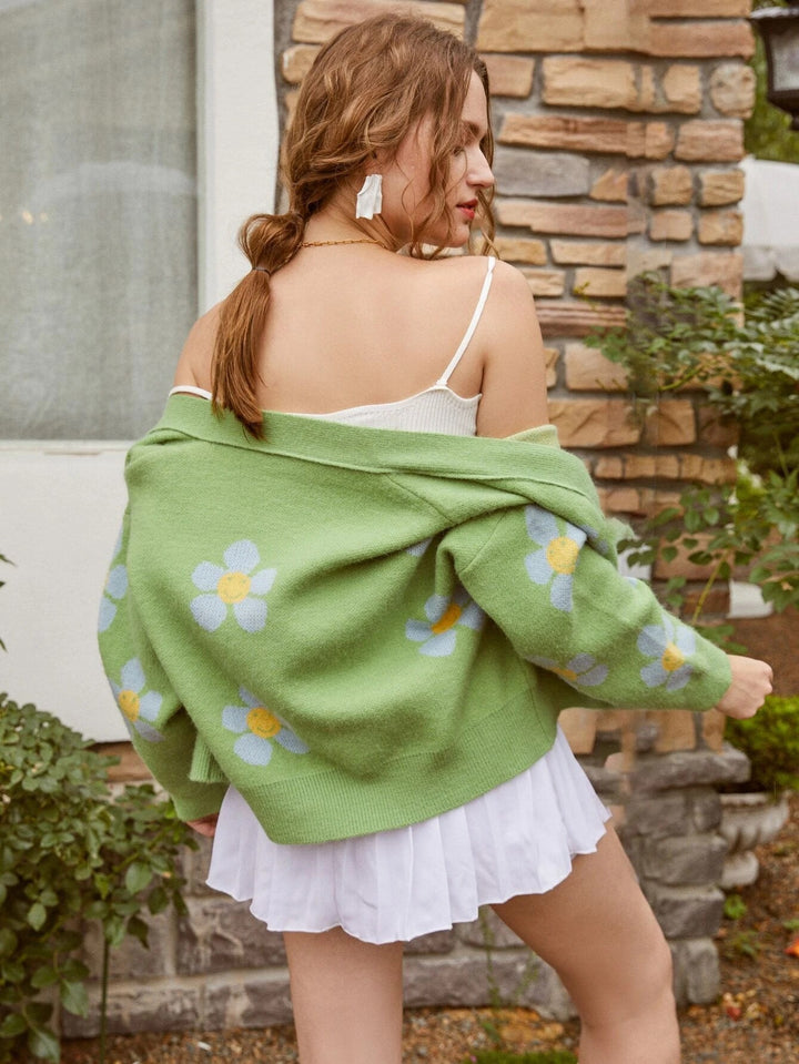 Kvinders chunky strik cardigan med blomstermønster og knapdetaljer Stilla