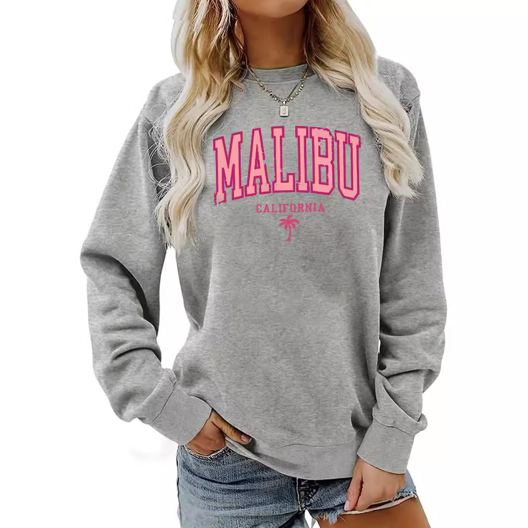 Dame sweatshirt med livligt Malibu-tryk og afslappet pasform Stilla