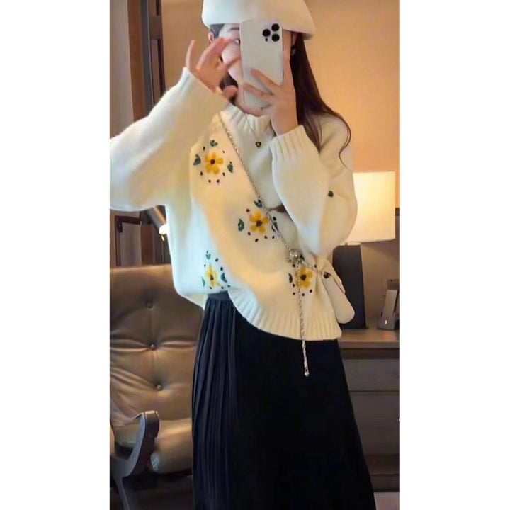 Women's knitted sweater with floral design Stilla