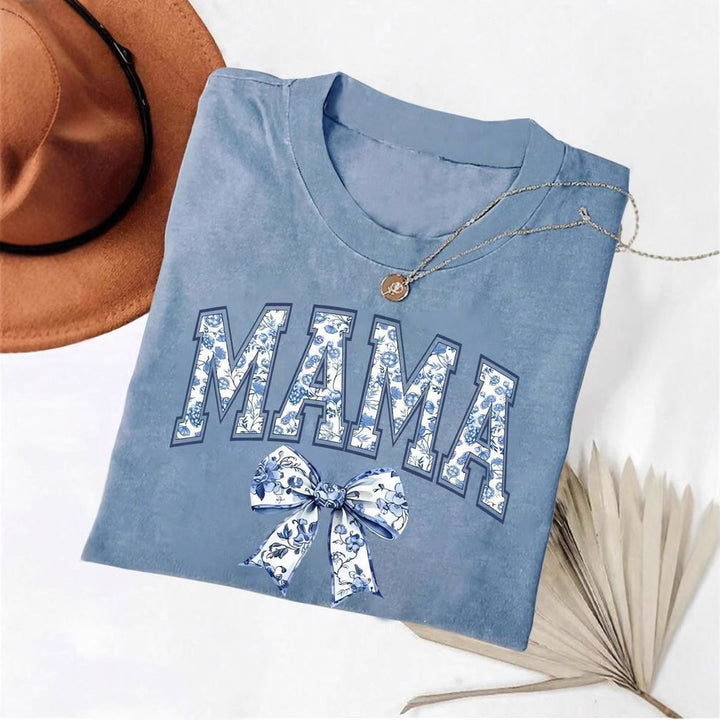 Dame T-shirt med blomster motiv og legende sløjfe dekoration Stilla