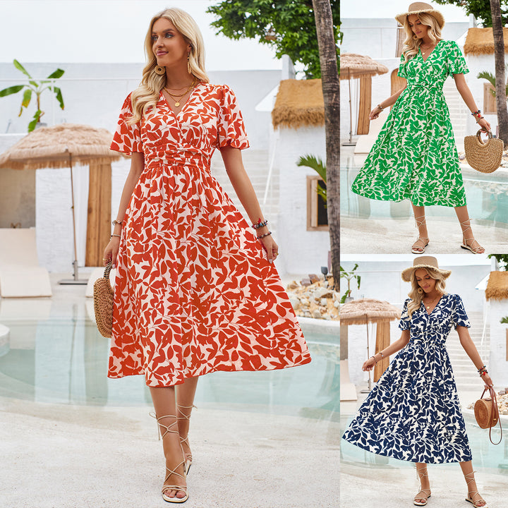 Dame maxikjole med blomstret print og figursyet design Stilla